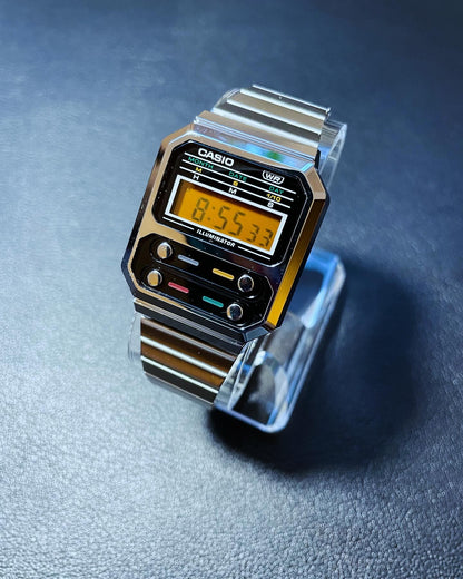 Ripley's Odyssey vintage custom digital watch with a stainless steel band and orange LED display, inspired by retro Casio designs.